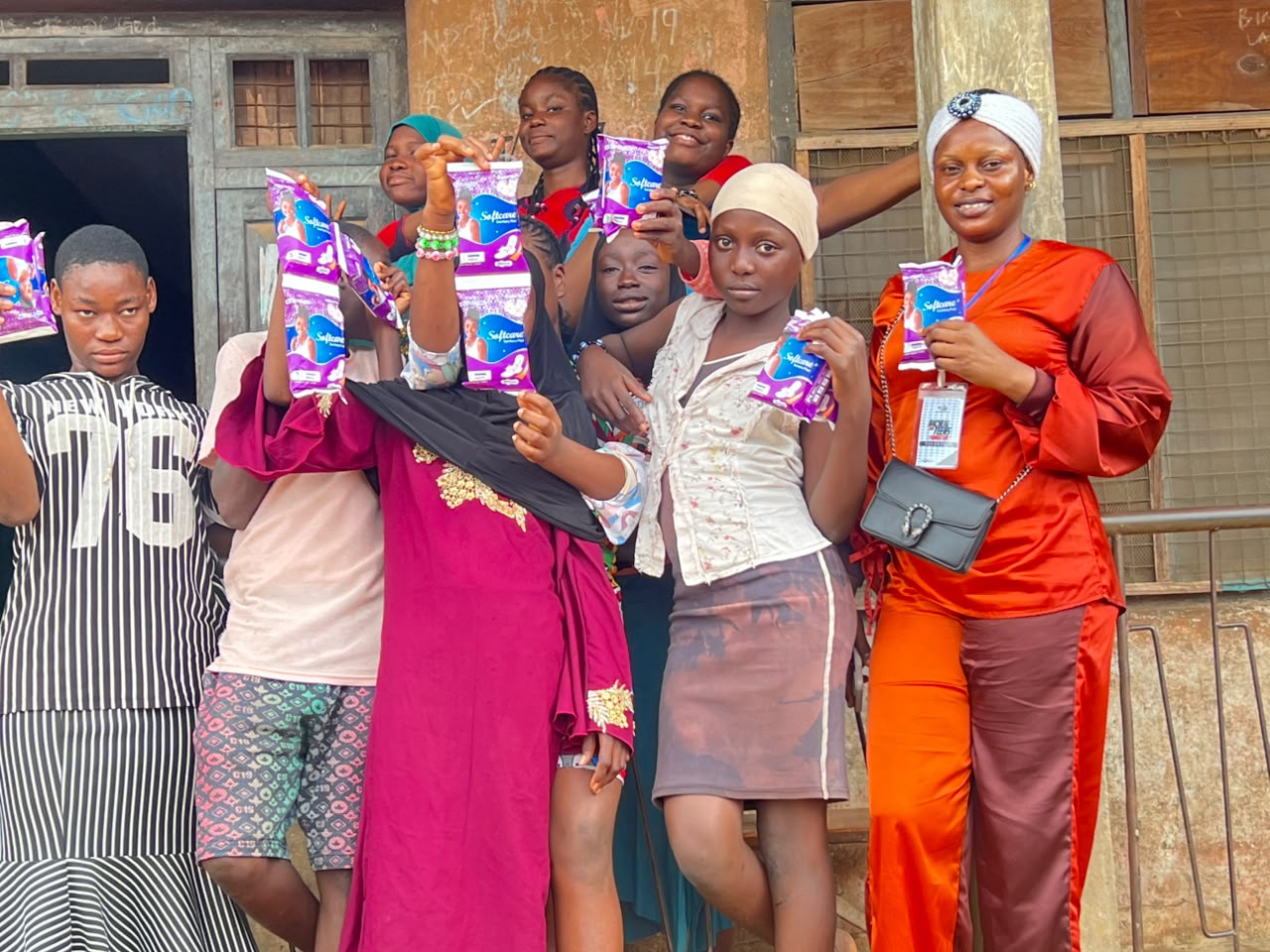 Girls receiving sanitary pads during the Ibadan outreach