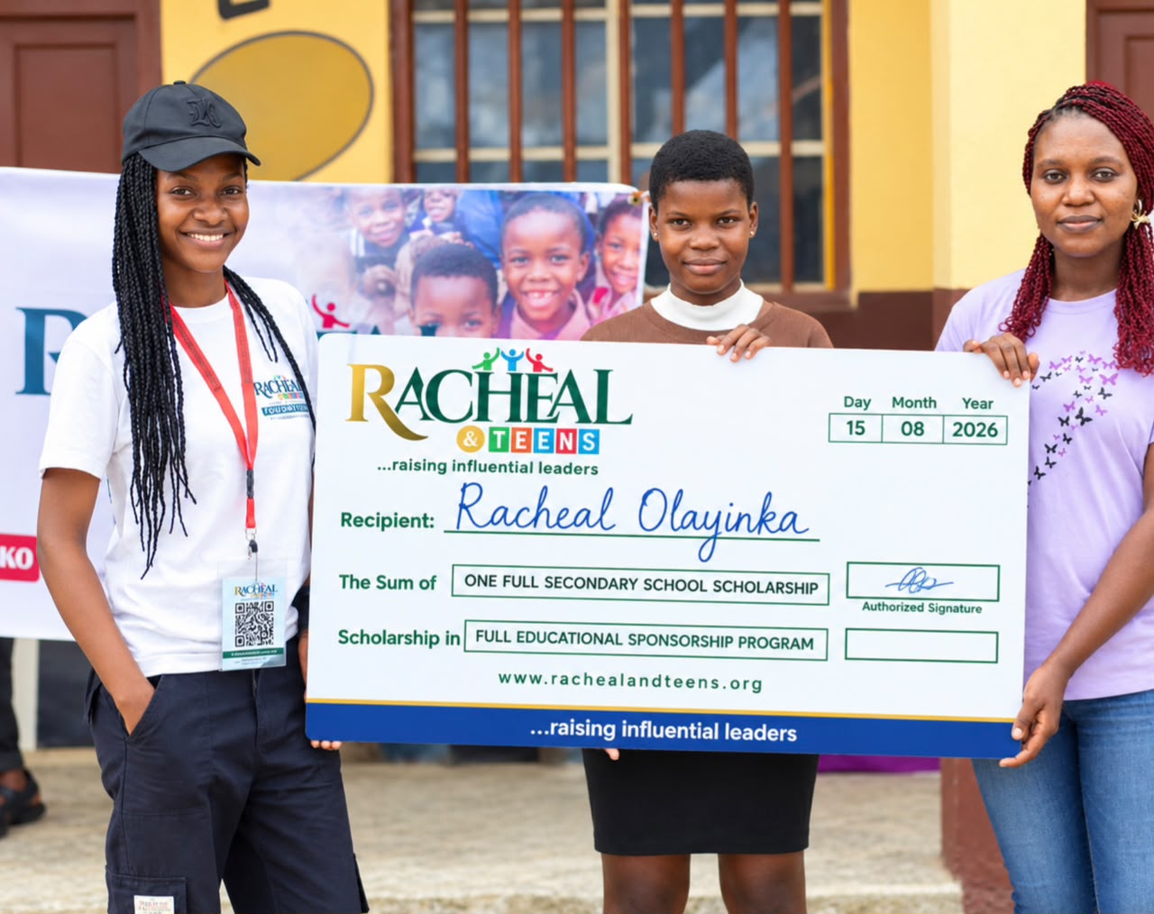 Racheal Olayinka receiving a full secondary school scholarship from Racheal and Teens Foundation